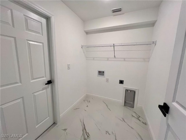 clothes washing area with hookup for a washing machine, hookup for an electric dryer, baseboards, and marble look tiles