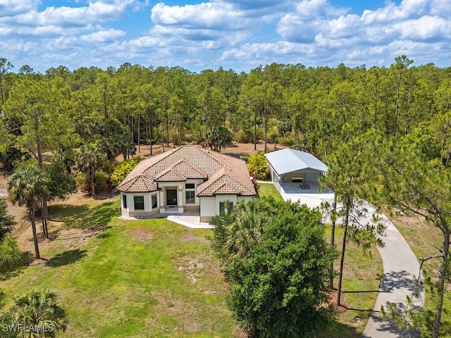 3818 2nd Ave NE, Naples, FL 34120 - view of subject property featuring a forest