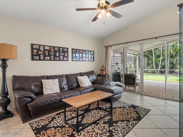 7930 Wexford Dr, Naples, FL 34104 - living area featuring a ceiling fan, vaulted ceiling, light tile patterned floors, and a sunroom