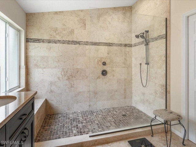 7930 Wexford Dr, Naples, FL 34104 - full bath featuring a tile shower and vanity