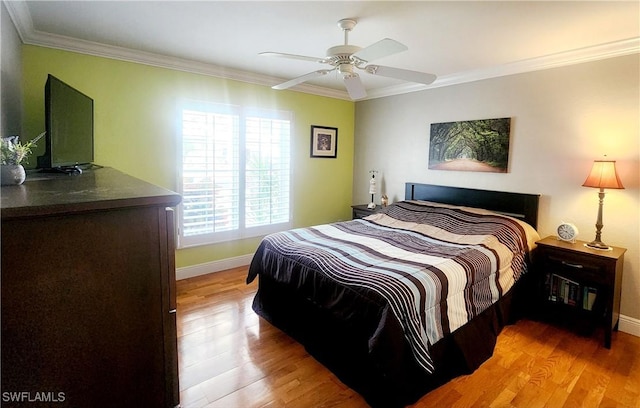 7930 Wexford Dr, Naples, FL 34104 - bedroom featuring crown molding, light wood-style floors, baseboards, and ceiling fan