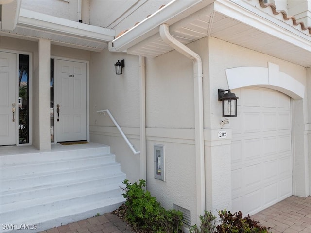 3471 Ballybridge Cir Unit 202, Bonita Springs, FL 34134 - property entrance with stucco siding