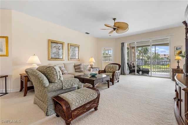 3471 Ballybridge Cir Unit 202, Bonita Springs, FL 34134 - living area featuring light colored carpet and ceiling fan