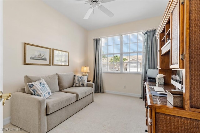 3471 Ballybridge Cir Unit 202, Bonita Springs, FL 34134 - living area with baseboards, light carpet, and ceiling fan