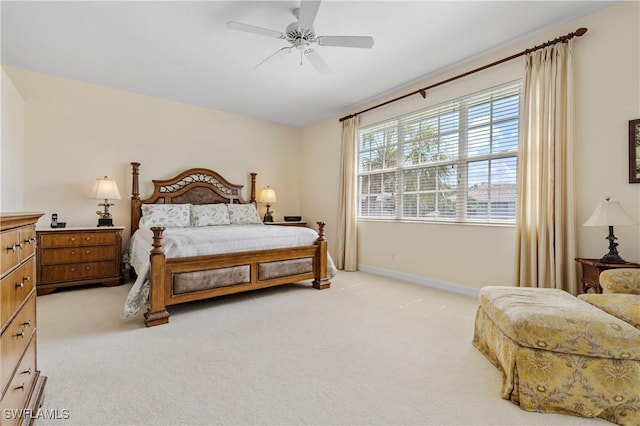3471 Ballybridge Cir Unit 202, Bonita Springs, FL 34134 - bedroom with light carpet, baseboards, and ceiling fan