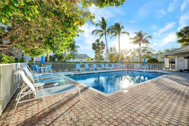 8315 Whisper Trace Way Unit C-102, Naples, FL 34114 - community pool featuring a patio