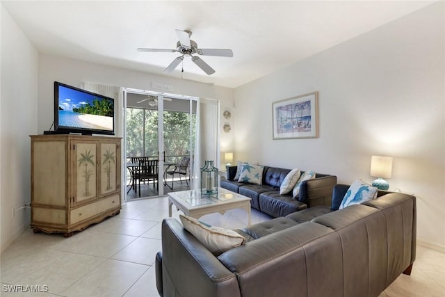 8315 Whisper Trace Way Unit C-102, Naples, FL 34114 - living room featuring a ceiling fan, light tile patterned floors, and baseboards