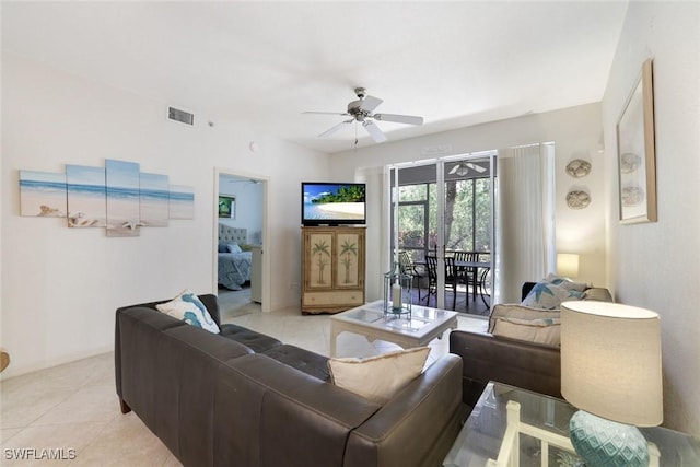 8315 Whisper Trace Way Unit C-102, Naples, FL 34114 - living area with a ceiling fan and light tile patterned floors