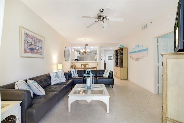 8315 Whisper Trace Way Unit C-102, Naples, FL 34114 - living room with a chandelier, a ceiling fan, and light tile patterned floors