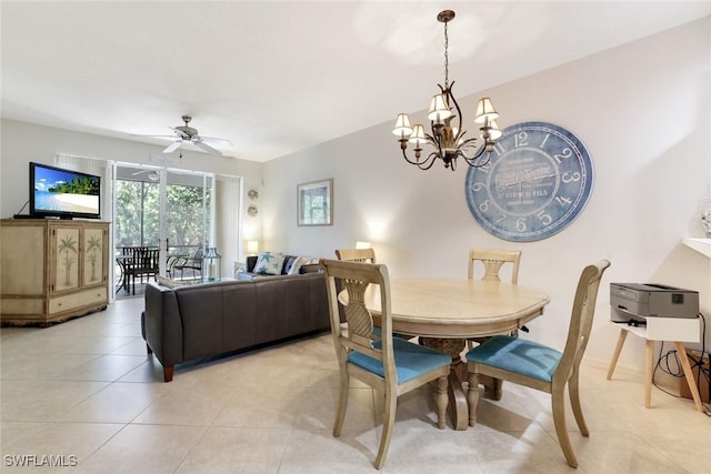 8315 Whisper Trace Way Unit C-102, Naples, FL 34114 - dining area featuring a chandelier, ceiling fan, and light tile patterned flooring