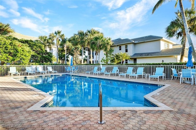8315 Whisper Trace Way Unit C-102, Naples, FL 34114 - community pool with a patio area