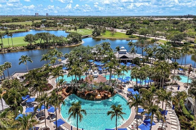 8315 Whisper Trace Way Unit C-102, Naples, FL 34114 - bird's eye view of a pool, a large body of water, and a golf course