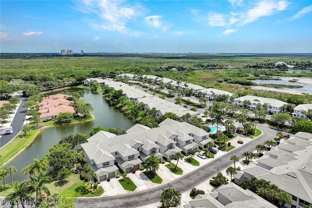8315 Whisper Trace Way Unit C-102, Naples, FL 34114 - aerial perspective of suburban area with a nearby body of water