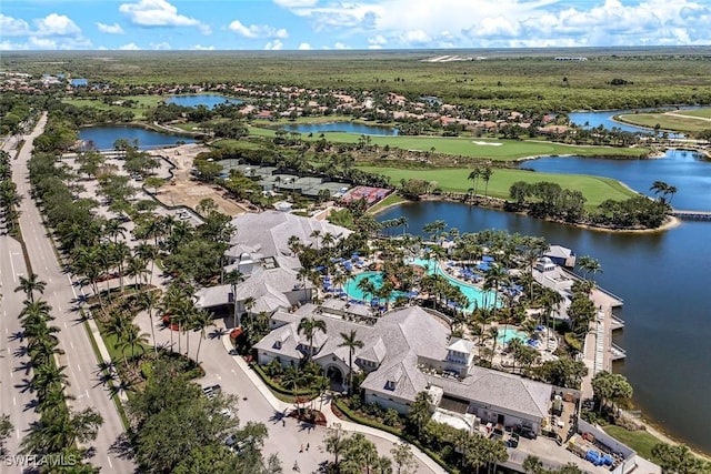 8315 Whisper Trace Way Unit C-102, Naples, FL 34114 - aerial perspective of suburban area featuring a large body of water and a golf course
