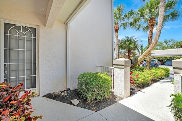 8315 Whisper Trace Way Unit C-102, Naples, FL 34114 - view of side of home with stucco siding