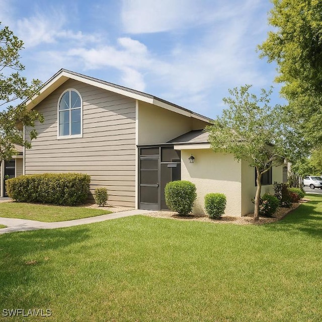 13353 Broadhurst Loop, Fort Myers, FL 33919 - view of front of property with a front yard