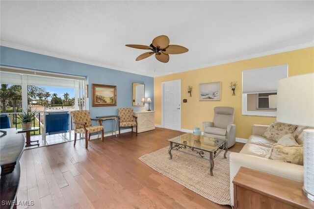 1155 Sandpiper St Unit G2, Naples, FL 34102 - living room featuring ceiling fan, wood finished floors, crown molding, and baseboards