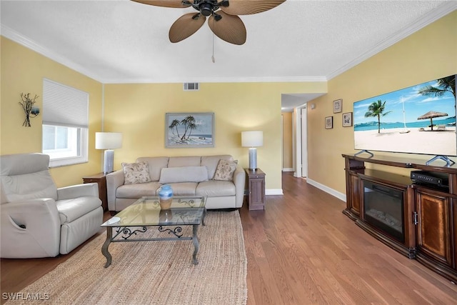 1155 Sandpiper St Unit G2, Naples, FL 34102 - living room with ornamental molding, wood finished floors, ceiling fan, and baseboards