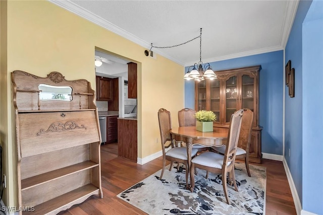 1155 Sandpiper St Unit G2, Naples, FL 34102 - dining area with crown molding, baseboards, wood finished floors, and a chandelier