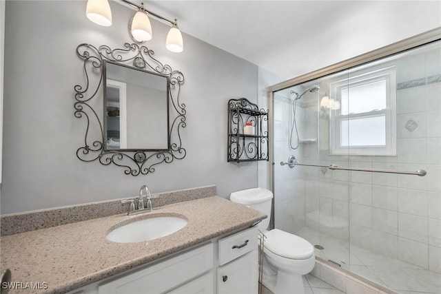 1155 Sandpiper St Unit G2, Naples, FL 34102 - full bathroom featuring a shower stall, toilet, and vanity