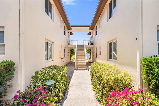 1155 Sandpiper St Unit G2, Naples, FL 34102 - view of exterior entry with stucco siding