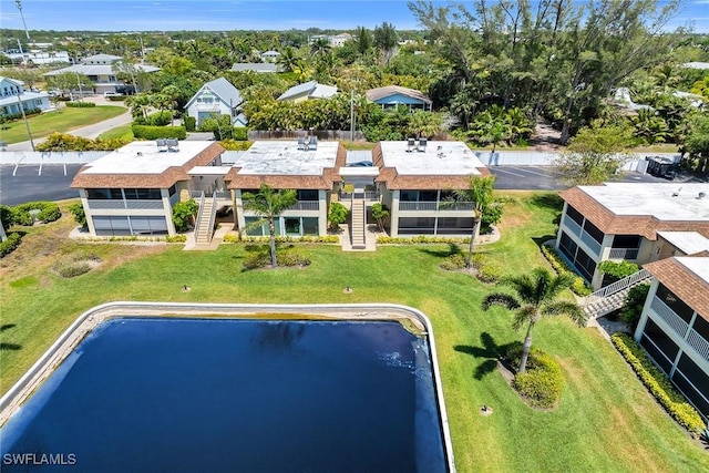 1155 Sandpiper St Unit G2, Naples, FL 34102 - view of subject property featuring a nearby body of water