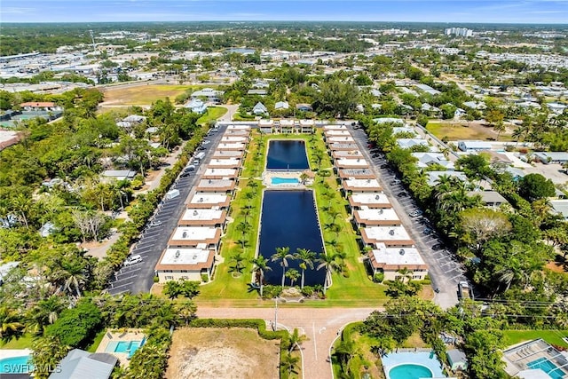 1155 Sandpiper St Unit G2, Naples, FL 34102 - bird's eye view of a nearby body of water and a pool area