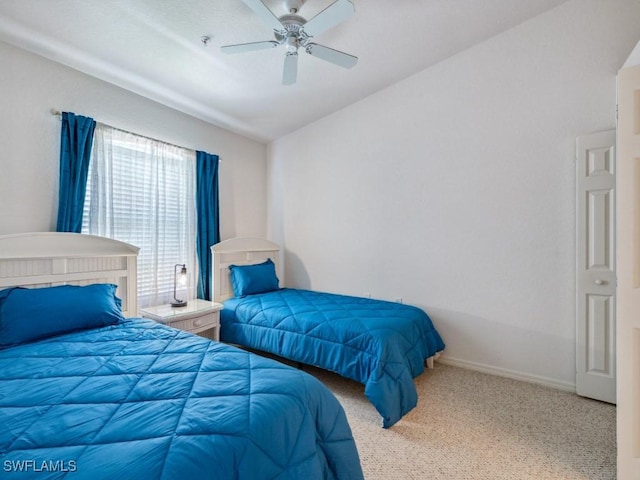 26660 Rosewood Pointe Cir Unit 205, Bonita Springs, FL 34135 - carpeted bedroom featuring a ceiling fan, baseboards, and lofted ceiling