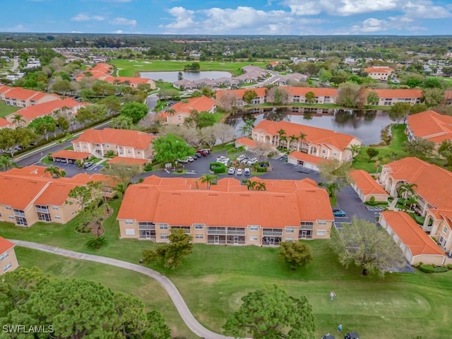 26660 Rosewood Pointe Cir Unit 205, Bonita Springs, FL 34135 - aerial view of residential area featuring a large body of water and a local golf course