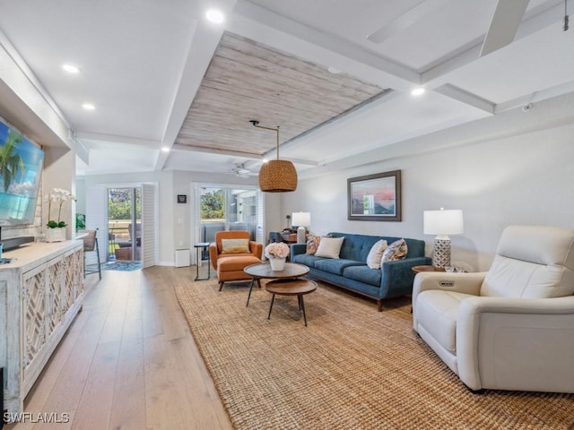 living room featuring a ceiling fan, beam ceiling, recessed lighting, light wood-style floors, and baseboards