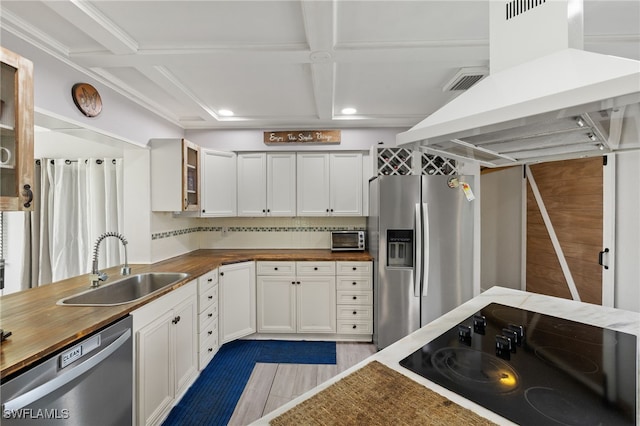 3275 Boca Ciega Dr Unit D49, Naples, FL 34112 - kitchen featuring appliances with stainless steel finishes, wooden counters, a sink, range hood, and coffered ceiling
