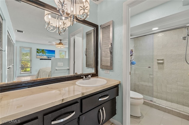 3275 Boca Ciega Dr Unit D49, Naples, FL 34112 - bathroom with a stall shower, toilet, a chandelier, vanity, and tile patterned floors