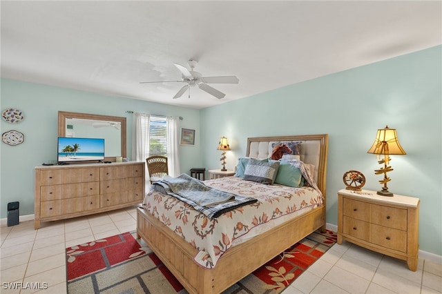3275 Boca Ciega Dr Unit D49, Naples, FL 34112 - bedroom with light tile patterned flooring, baseboards, and ceiling fan