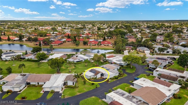 3275 Boca Ciega Dr Unit D49, Naples, FL 34112 - aerial overview of property's location featuring a large body of water and nearby suburban area