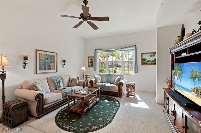 9224 Campanile Cir Unit 103, Naples, FL 34114 - living room with a ceiling fan, light colored carpet, and baseboards