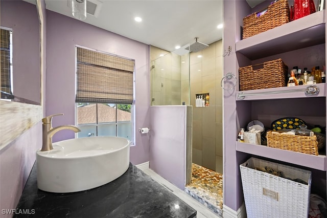 8151 New Jersey Blvd, Fort Myers, FL 33967 - bathroom featuring walk in shower, a sink, recessed lighting, and baseboards