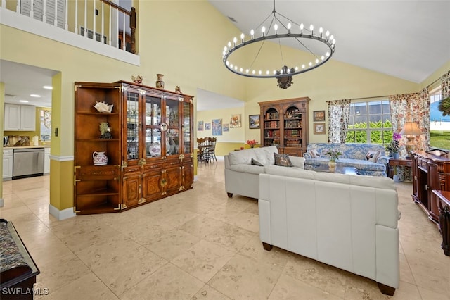 8151 New Jersey Blvd, Fort Myers, FL 33967 - living room with high vaulted ceiling, a chandelier, light tile patterned flooring, and baseboards