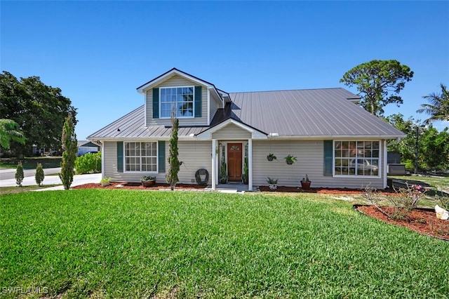 8151 New Jersey Blvd, Fort Myers, FL 33967 - traditional home featuring a front lawn and metal roof