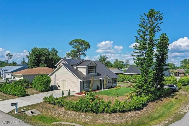 8151 New Jersey Blvd, Fort Myers, FL 33967 - view of side of home featuring driveway and central air condition unit