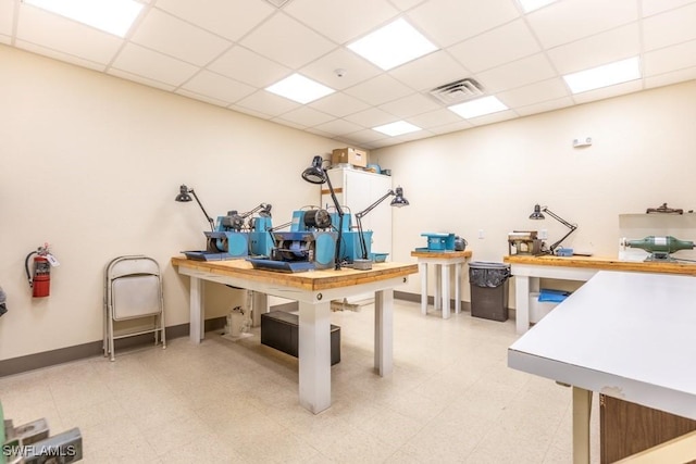 7410 Lake Breeze Dr Unit 204, Fort Myers, FL 33907 - home office with a paneled ceiling and light flooring