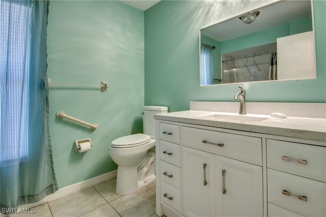 3914 SW 8th Ct Unit 103, Cape Coral, FL 33914 - bathroom with vanity, tile patterned flooring, toilet, curtained shower, and baseboards