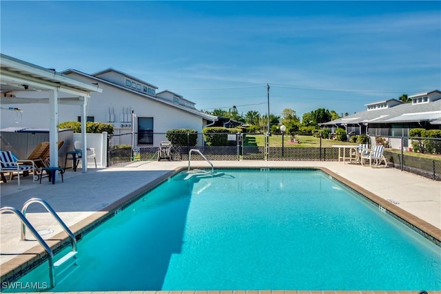 3914 SW 8th Ct Unit 103, Cape Coral, FL 33914 - community pool with a patio area