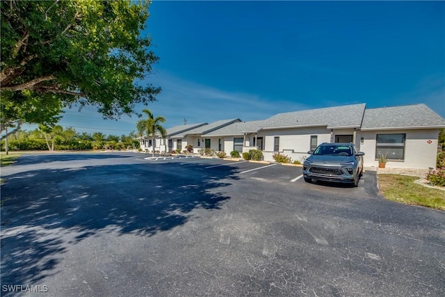 3914 SW 8th Ct Unit 103, Cape Coral, FL 33914 - ranch-style house featuring uncovered parking
