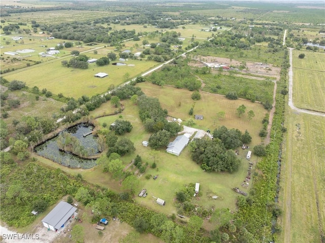 1291 S Swinging Trl, Labelle, FL 33935 - aerial view of property and surrounding area with rural landscape