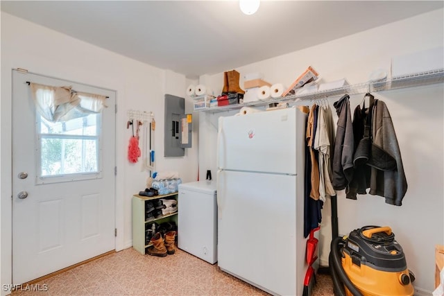 1291 S Swinging Trl, Labelle, FL 33935 - clothes washing area with electric panel, washer / clothes dryer, and light flooring