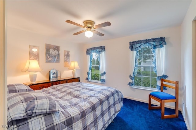 1291 S Swinging Trl, Labelle, FL 33935 - bedroom with carpet, baseboards, and a ceiling fan