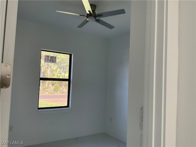 760 Fullerton Ave S, Lehigh Acres, FL 33974 - empty room featuring ceiling fan and baseboards