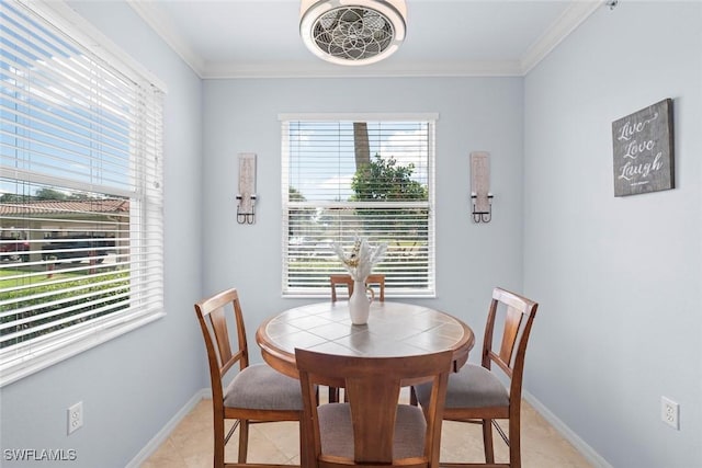 10317 Heritage Bay Blvd Unit 1418, Naples, FL 34120 - dining room with baseboards and crown molding