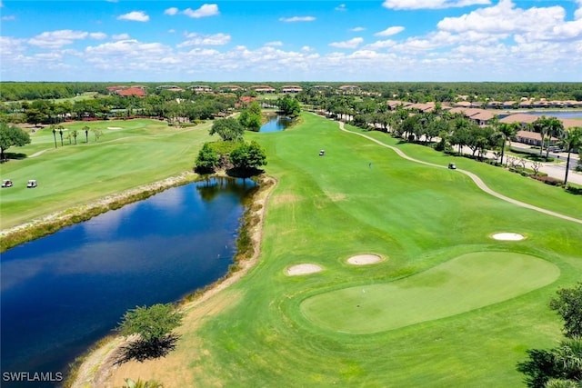 10317 Heritage Bay Blvd Unit 1418, Naples, FL 34120 - aerial perspective of suburban area featuring a nearby body of water, a golf course, and a tree filled landscape