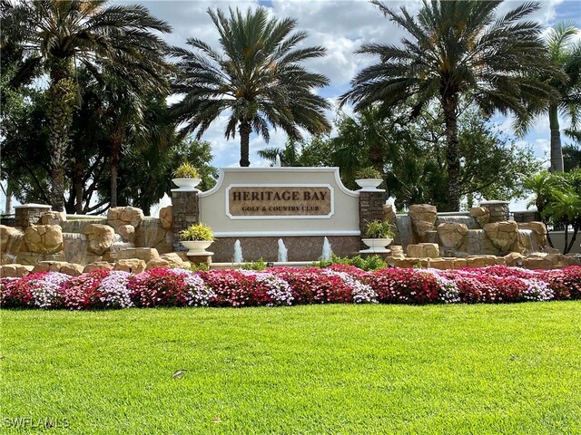 10317 Heritage Bay Blvd Unit 1418, Naples, FL 34120 - community sign featuring a lawn